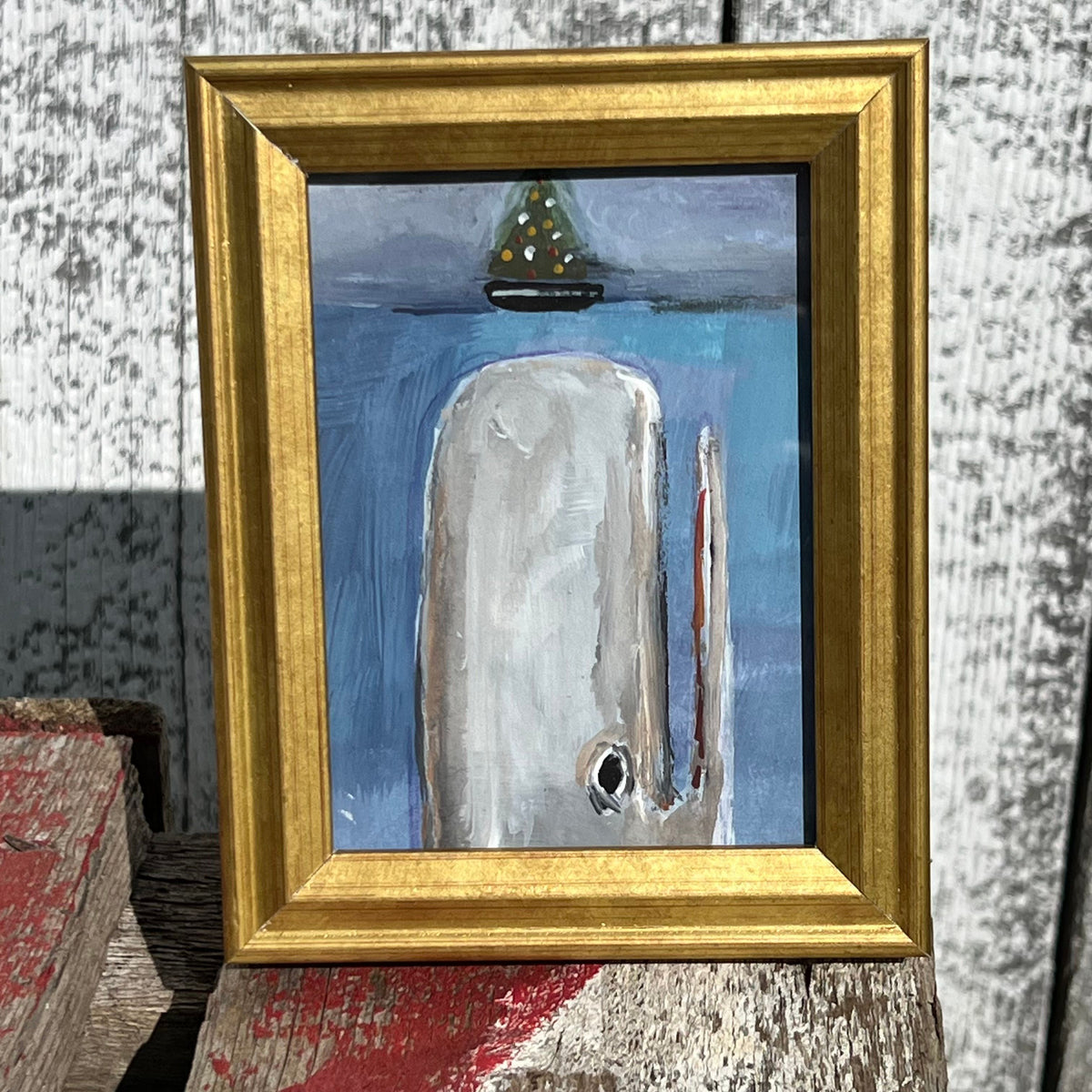 Framed Rectangular Giclee of Rising Whale Beneath Christmas Tree on Boat - Tabletop