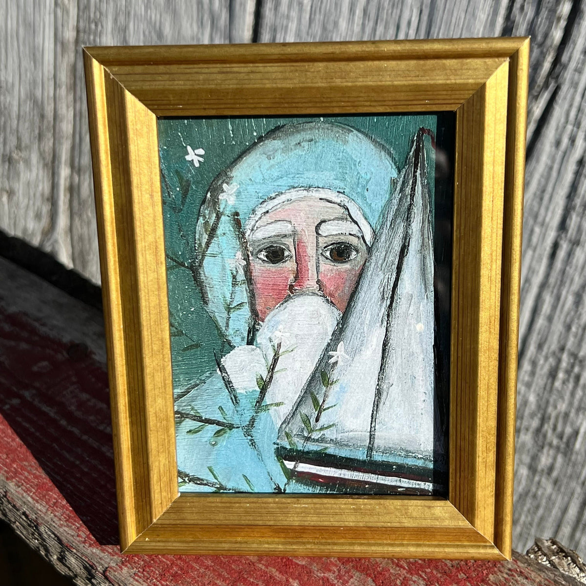 Framed Mini Rectangular Giclee of Blue Santa Holding Sailboat - Tabletop