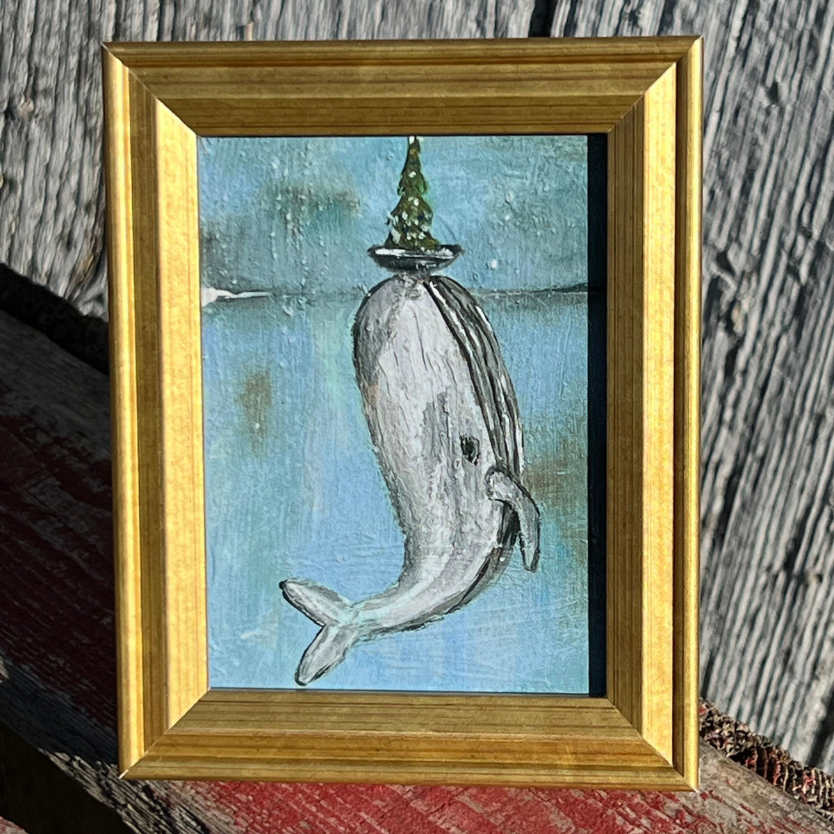 Framed Mini Rectangular Giclee of Rising Whale Beneath Christmas Tree on a Boat - Tabletop