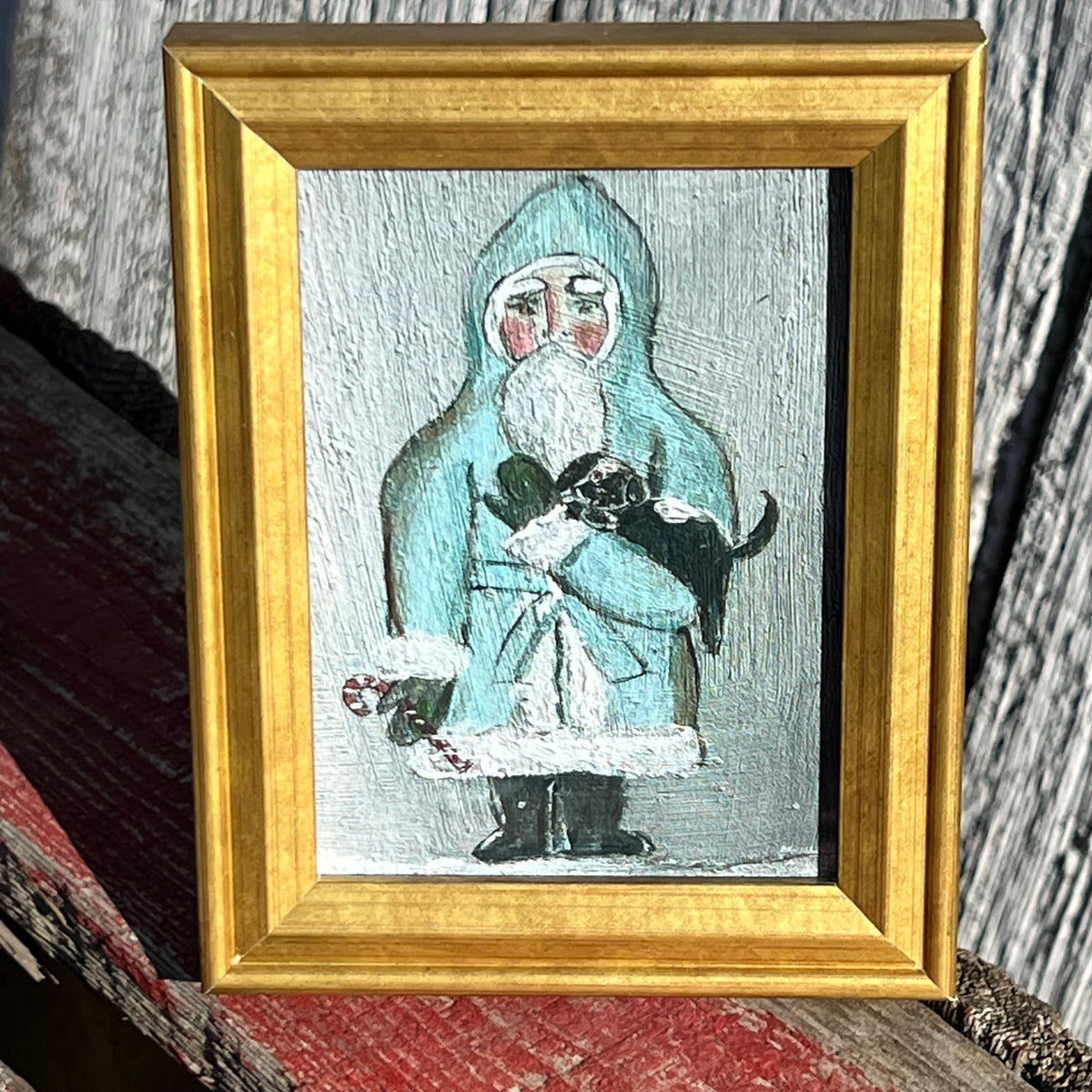Framed Mini Rectangular Giclee of Blue Santa Holding His Dog - Tabletop